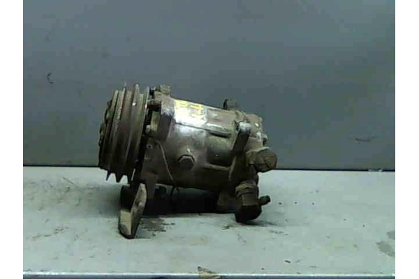 Recambio de compresor aire acond. para opel astra f berlina 1.6 i referencia OEM IAM 1854031  