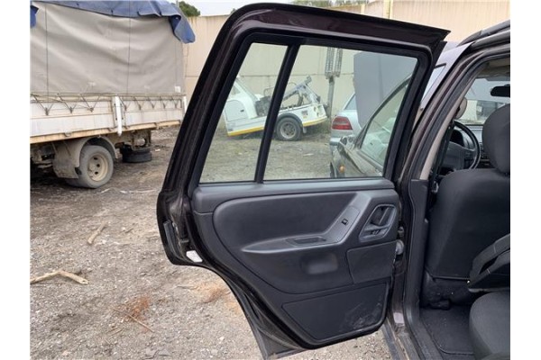 Recambio de puerta trasero izquierda para jeep grand cherokee (wj/wg) 2.7 crd laredo referencia OEM IAM 55136701AG  