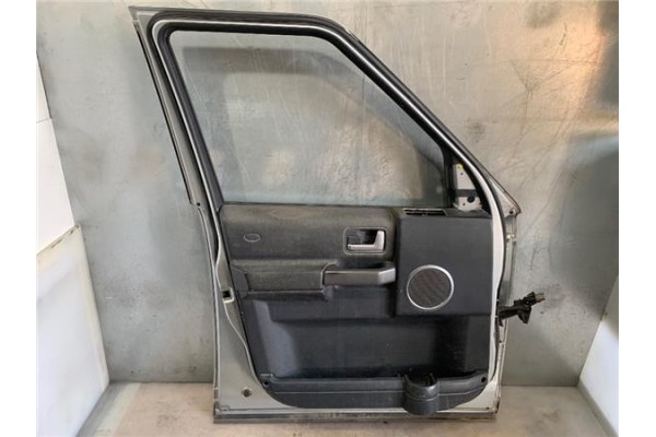 Recambio de puerta delantero izquierda para land rover discovery 2.7 td referencia OEM IAM BDA780110  