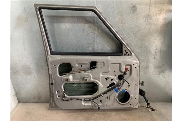 Recambio de puerta delantero izquierda para jeep cherokee (xj) 2.5 td referencia OEM IAM 55235907AA  