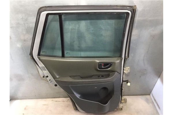 Recambio de puerta trasero izquierda para hyundai santa fe (sm) 2.0 crdi 4x4 referencia OEM IAM 7700326110  