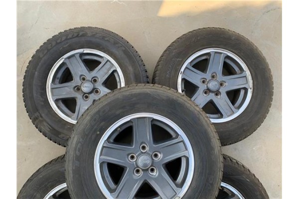 Recambio de juego llantas para jeep wrangler / wrangler unlimited (jk) 2.8 sahara referencia OEM IAM 5JX82TRMAA  