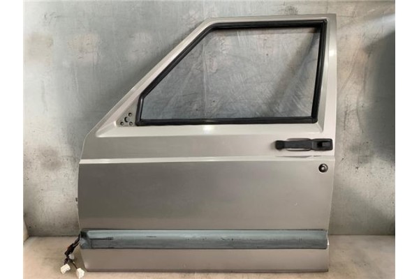 Recambio de puerta delantero izquierda para jeep cherokee (xj) 2.5 td referencia OEM IAM   