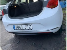 Recambio de paragolpes trasero para opel astra j berlina 5p 1.6 selective referencia OEM IAM 13364582  