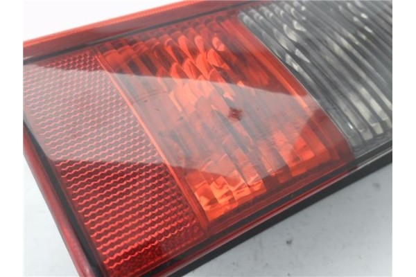 Recambio de piloto trasero izquierdo para opel combo furgón/ranchera familiar 1.7 di 16v referencia OEM IAM E95302  