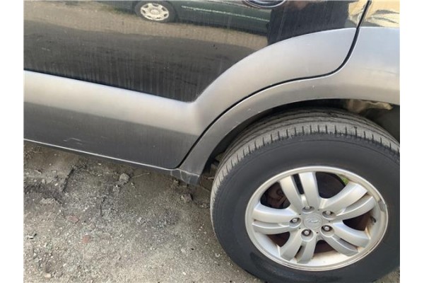 Recambio de aletin trasero izquierdo para hyundai tucson (jm) 2.0 referencia OEM IAM 877432E001  