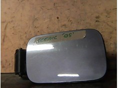 TAPA EXTERIOR COMBUSTIBLE 