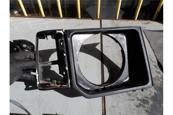 Recambio de cerquillo faro para mitsubishi pajero 2.5 td referencia OEM IAM   